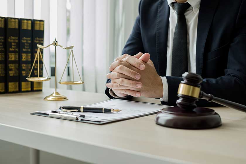 Professional man lawyers work at a law office There are scales, Scales of justice, judges gavel, and litigation documents